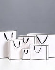 White with Black Border Paper Gift Bag w/ free tissue