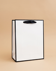 White with Black Border Paper Gift Bag w/ free tissue