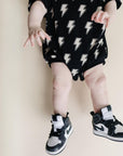 Short Sleeve Bubble Romper | Black Bolts