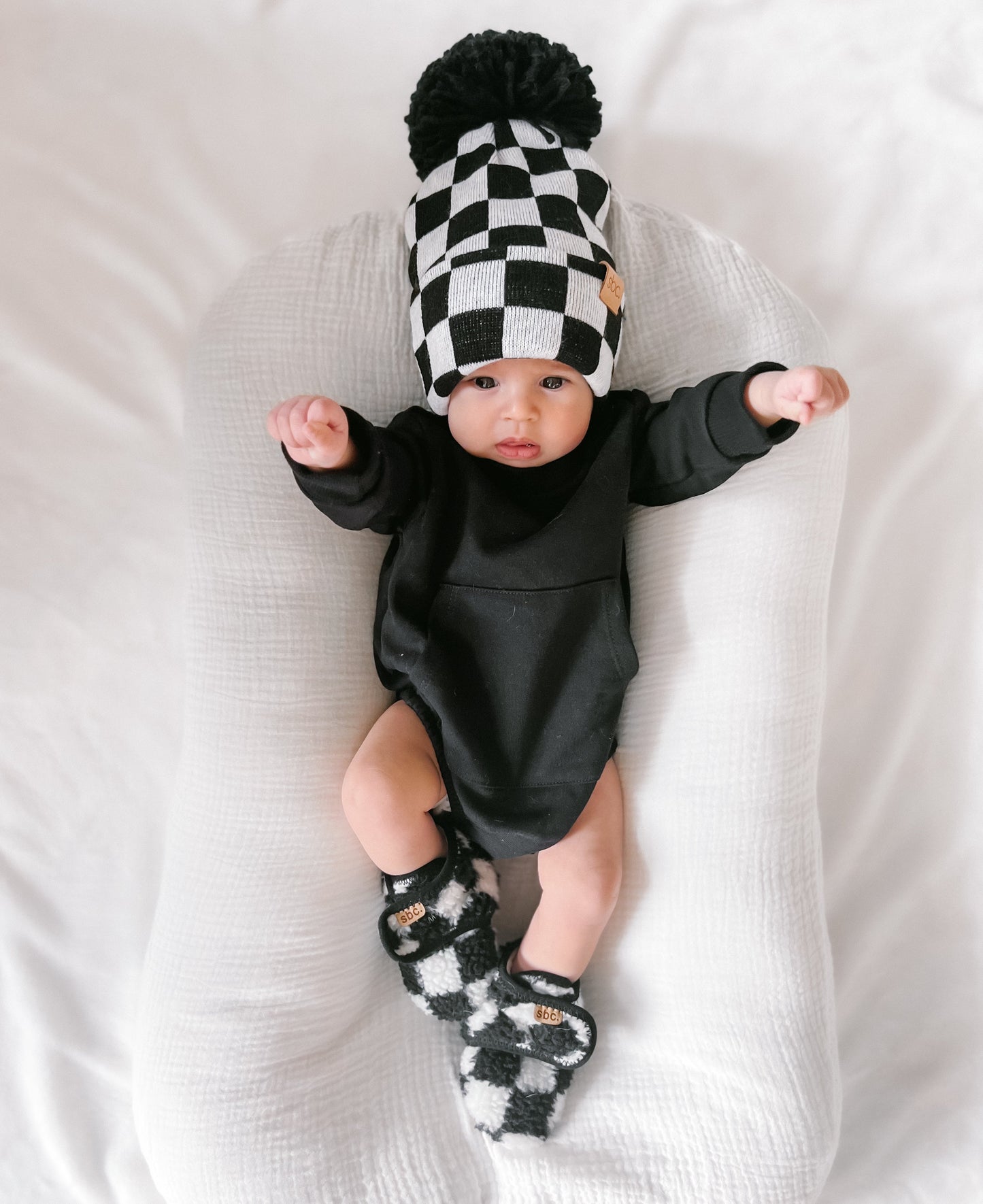 The Newborn Beanie — Black + White Checkered