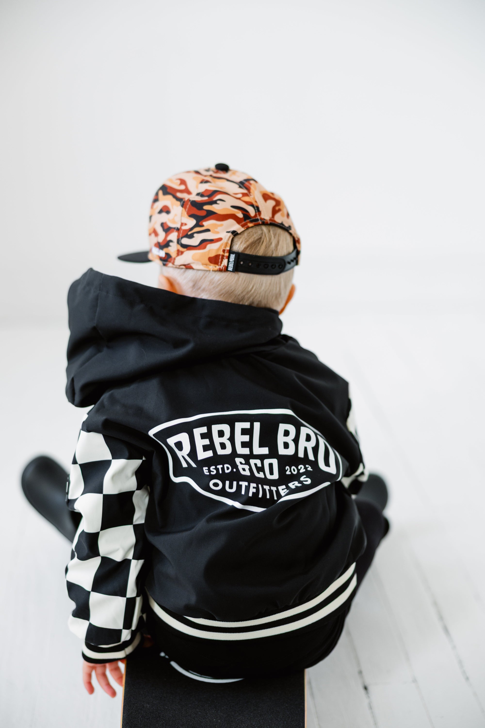 Hydro Letterman Jacket in Black + Cream Checkered