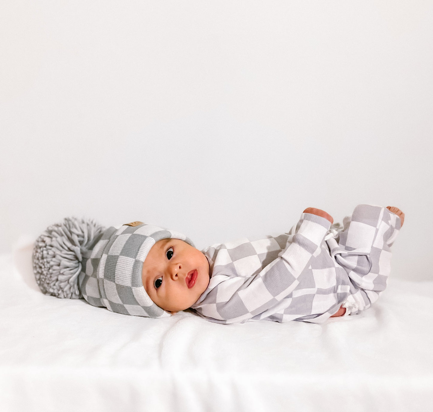 The Newborn Beanie — Pewter + White Checkered