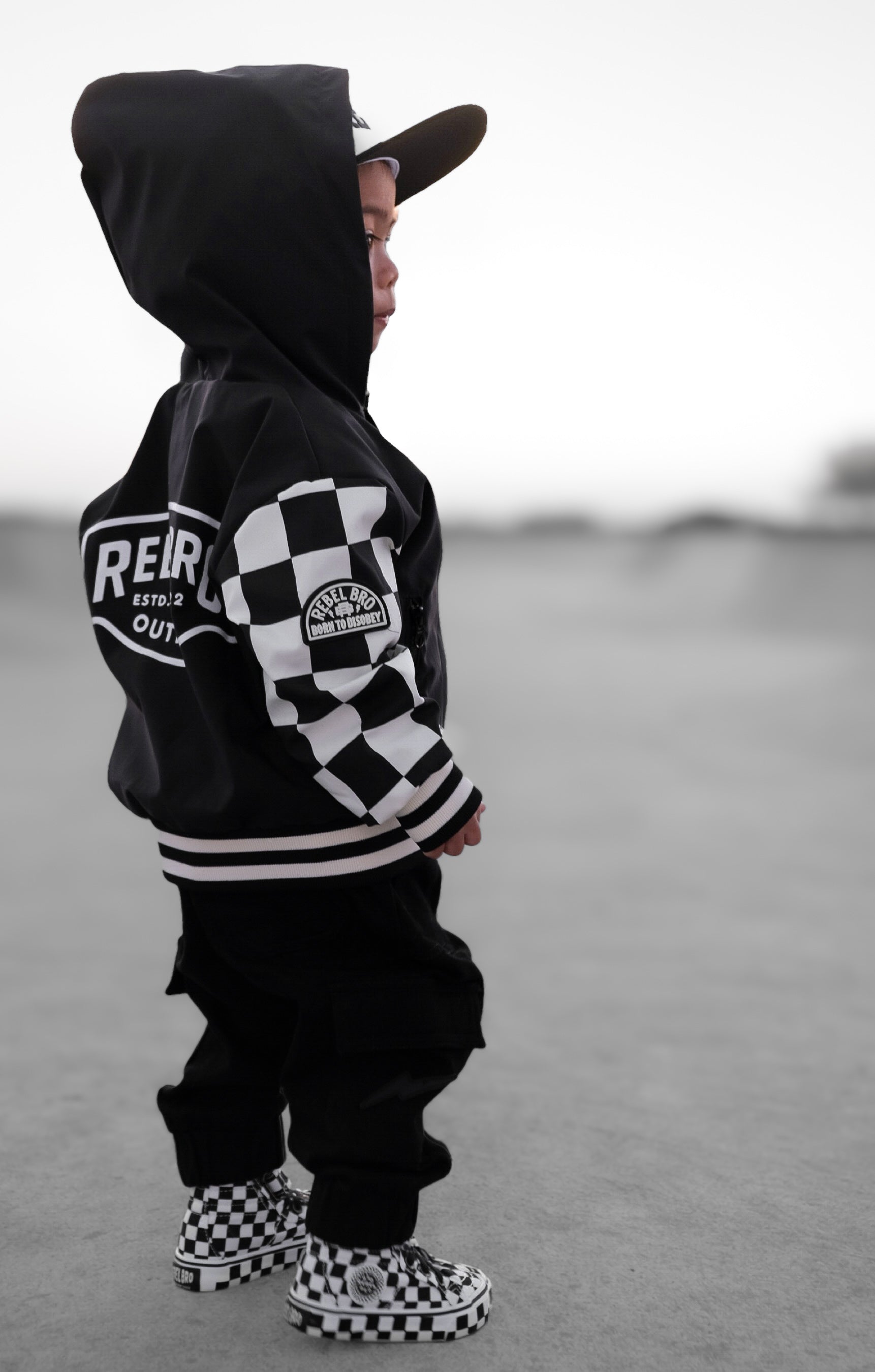 Hydro Letterman Jacket in Black + Cream Checkered