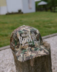 We'll Put A Boot in your Ass - Camo Trucker Hat